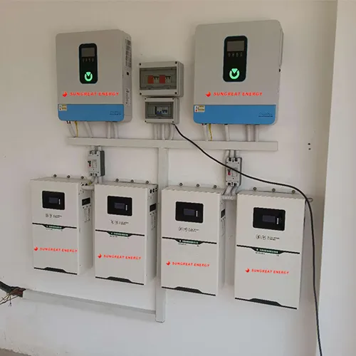 All in one battery and inverter wheeled power station standing indoors next to solar panels