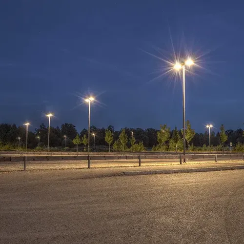 QC LED lights illuminating an outdoor project site at night