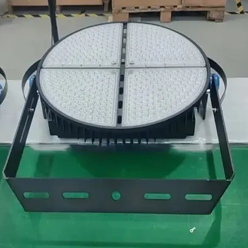 Front view of the QC Series sports field light with four LED modules and an adjustable mounting bracket
