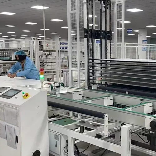 LP Series solar panels moving through automated manufacturing equipment on the factory production line