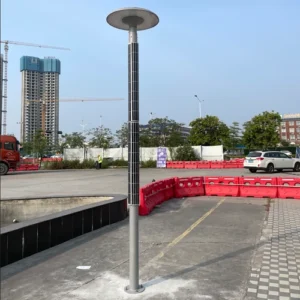 vertical solar garden light installed in urban square with modern buildings