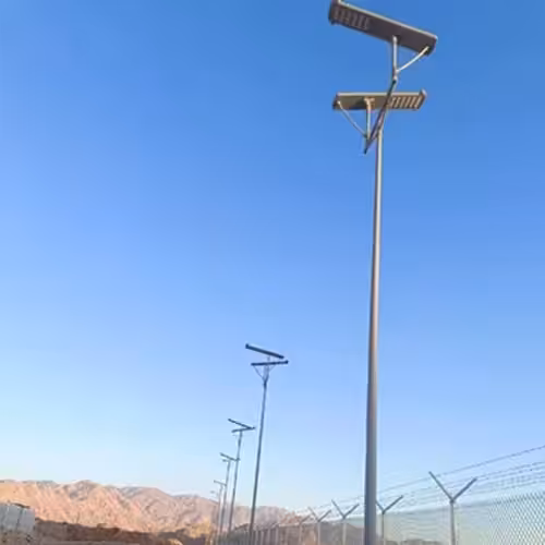 solar street light with self cleaning panel installed along desert road in Middle East project