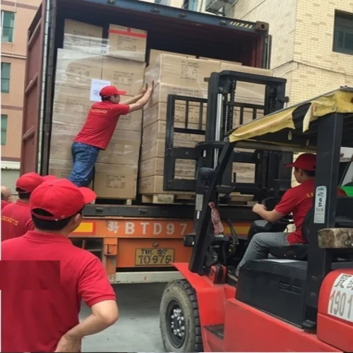 Sungreat Energy QC Series LED stadium lights being loaded into container for shipment to UAE