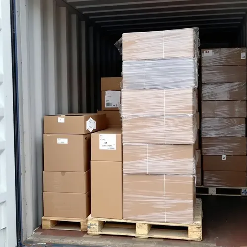 FXC integrated solar street lights with cameras packed on pallets and loaded inside a shipping container